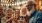 a group of people holding glasses of wine